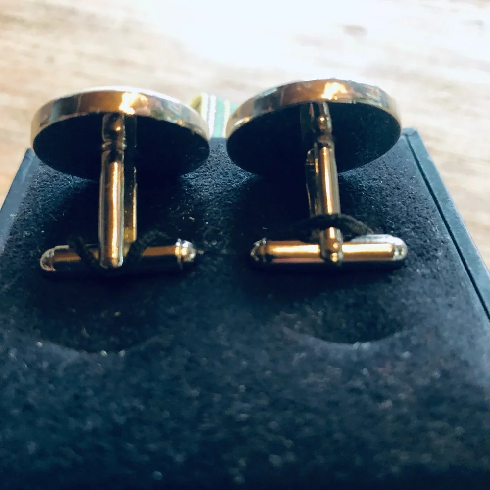 Paul Smith Golden retriever cufflinks.